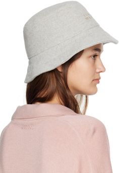 Felted wool-blend bucket hat in gray. · Logo embroidered at face · Quilted brim · Full cotton muslin lining Supplier color: Light grey Casual Wool Bucket Hat With Curved Brim, Spring Gray Bucket Hat, Isabel Marant Etoile, Cotton Muslin, Felted Wool, Muslin Cotton, Logo Embroidered, Isabel Marant, Color Light