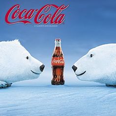 two polar bears with coca - cola bottles in the snow