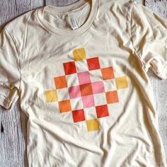 Happy little patchwork tee! 100% combed and ring-spun cotton, NOTE this tee is slightly different from the triblend tees in the shop. The sizing and fit is the same but this tee is 100% cotton (heather colors do naturally have some poly) and a tad heavier in weight and with a little less stretch than the triblend. Contemporary/modern unisex fit - true to size Care We use the latest direct-to-garment (DTG) printing technology and high-quality inks that won't fade for a long time if taken care of Patchwork Tee, Jean Crafts, Diy Clothing, Garment Labels, Bella Canvas Tees, Dtg Printing, Star Designs, Design House, Diy Clothes