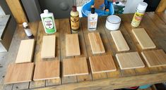 wooden cutting boards and glues on top of a table