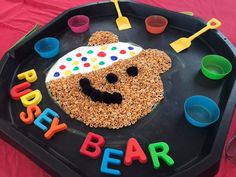 a birthday cake made to look like a bear with the words happy bear on it