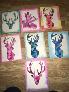 six different colored deer head paintings on paper