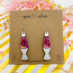 the earrings are made out of polymer and have colorful designs on each earwires