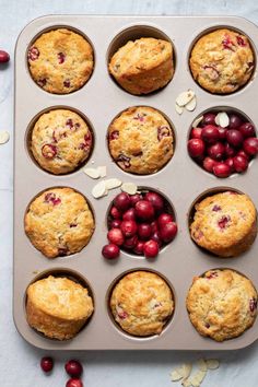 muffins with fresh cranberries and almonds in a muffin tin