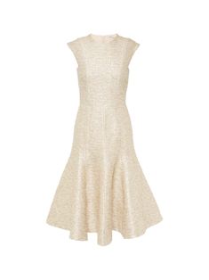 The Denver Midi Dress by Emilia Wickstead features a tweed design with metallic yarns creating a rich texture. It has a jewel neck and hidden back-sip closure and is lined for extra comfort. Pair with the matching jacket to complete the look.[tab] Composition: 48% viscose, 25% acrylic, 13% wool, 7% polyester, 7% metallic fibres; Lining: 100% polyester Size and Fit: Runs True to Size Care Instructions: Dry Clean Only Origin: Made in the UK SKU: EMW49P75 Questions about size, fit, or how to style? Emilia Wickstead, Metallic Yarn, Midi Cocktail Dress, Dress Home, Red Midi Dress, Mini Cocktail Dress, Jewel Neck, Silver Dress, Gold Dress