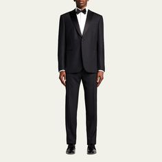 Brioni solid tuxedo with satin lapels Peaked lapels; single-button front Chest and side welt pockets Long sleeves; four-button cuffs Regular-rise trousers Full length with creasing Button/zip fly; belt loops Unfinished hem to be tailored to desired length Wool Made in Italy Luxury Black Tie Suit With Hidden Button Closure, Luxury Black Tie Suit With Hidden Buttons, Formal Tuxedo Three-piece Suit With Lapel Collar, Single Breasted Tuxedo For Formal Occasions, Elegant Formal Tuxedo With Welt Pockets, Formal Three-piece Tuxedo Suit With Lapel Collar, Single-breasted Tuxedo For Formal Occasions, Evening Tailored Double Breasted Suit With Pressed Crease, Formal Three-piece Tuxedo Suit