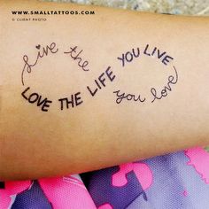 a woman's arm with writing on it that says live the life you love