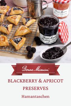 blackberry and apricot preservess on a cooling rack with jam in the background