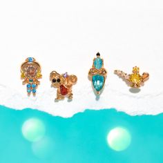 Get whisked away to the land of Arabian nights in the Disney Princess Jasmine Earring Set! Embellished with vibrant and mesmerizing stones, this set features some of your favorites including, Princess Jasmine, Aladdin's friend Abu, the Genie, and his lamp of course! Unlock a whole new world in this set! Disney Princess Sleeping Beauty, Princess Sleeping Beauty, Earrings Disney, Princess Snow White, Disney Princess Tiana, Disney Princess Jasmine, Minnie Mouse Earrings, Disney Princess Snow White, Aladdin And Jasmine