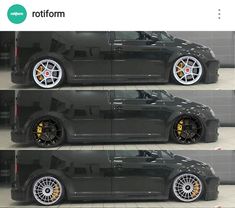 the side view of a black car with gold wheels and rims on it's tires