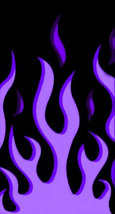 purple flames on black background in the dark