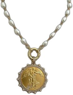 a gold and white necklace with an image of a woman on it