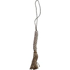 a white tasselle hanging from a rope on a white background with the string attached to it