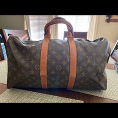 This Is A Beautiful Authentic Louis Vuitton Vintage M41428 Monogram Keepall 45 Boston Bag It’s A Perfect Over Night Bag... I Used It For Many Years And Does Have Wear On The Leather But Nothing Significant. Doesn’t Have The Strap That Goes With It However One Can Be Purchased Online. Over All In Good Condition. This Bag Was Manufactured Before 1987 Meaning It Doesn’t Have A Date Code However It Has The Country Manufacturer Code. This One Was Manufactured In France. Over Night Bag, Lv Keepall 45, Louis Vuitton Keepall Black, Keepall 50 Louis Vuitton, Keepall 45, Louis Vuitton Keepall 45, Louis Vuitton Vintage, Over Night, Louis Vuitton Keepall