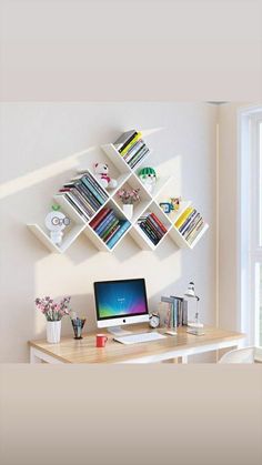 a desk with a laptop and bookshelf above it