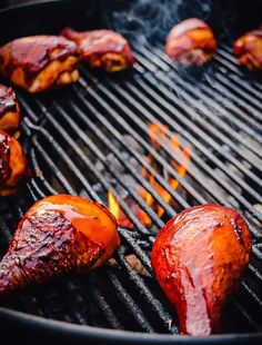 hot dogs are cooking on the grill and being grilled