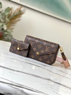 Inspired by the versatile Félicie Pochette, the Félicie Strap & Go in iconic Monogram canvas offers even more options. The main pouch holds everyday essentials, including a smartphone, while a removable mini-pouch, ideal for a transport or contactless card, is attached to the jacquard strap. The strap can be adjusted for multiple carry options. Detailed Features 17 x 9.6 x 3.5 cm (Length x height x width ) Monogram coated canvas Jacquard textile strap Microfiber and cowhide-leather lining Gold-c Lv Multi Pochette, Pochette Louis Vuitton, Louis Vuitton Felicie, Go Bag, Go Bags, Mini Pouches, Handbag Wallet, Wallet Accessories, Coach Bag