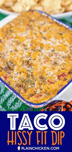 a casserole dish filled with taco cheese and topped with tortilla chips