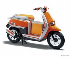 an orange and silver scooter on a white background