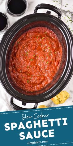 crockpot spaghetti sauce in a slow cooker with the title overlay above it