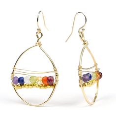 Chakra Earrings with Sterling Silver French Ear Wires Approx. 1.75" drop from ear Bead Size : 4mm Amethyst, Lapis Lazuli, Moonstone, Peridot, Citrine, Carnelian and Ruby Handcrafted at Beads of Paradise NYC Multicolor Teardrop Spiritual Jewelry, Gold Spiritual Beaded Earrings For Gifts, Handmade Rainbow Teardrop Jewelry, Nickel-free Rainbow Teardrop Earrings, Pierced Teardrop Beaded Earrings As Gift, Pierced Teardrop Beaded Earrings For Gift, Teardrop Beaded Earrings For Gift, Spiritual Teardrop Earrings With Ear Wire, Rainbow Teardrop Jewelry For Gifts