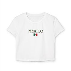 This Mexico baby tee is perfect for women looking to show off their Hispanic heritage with style. The Y2K Tee design gives off a trendy and retro vibe, making it a great addition to any casual outfit. Ideal for those celebrating Mexican culture and heritage. Product features - 100% organic cotton for sustainable fashion choice - Direct-to-Film (DTF) print for high-quality design - Slim fit for a flattering silhouette - Medium fabric weight for comfort - Tear-away label for added convenience Care instructions - Machine wash: cold (max 30C or 90F), gentle cycle - Do not bleach - Tumble dry: low heat - Iron, steam or dry: low heat - Do not dryclean Mexico Shirt, Mexico Tshirts, Mexico Tee Shirts, Mexican Babies, Outfits For Mexico, Hispanic Heritage, Baby T Shirts, Mexican Culture, Tee Design