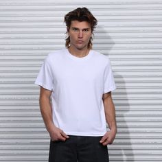 Introducing an updated version of our most popular crop tee, the Silverlake II. The Silverlake II has the same body as the original tee, except it's one (1) inch shorter per size. This is more than just a t-shirt; it's a carefully constructed garment that flatters the wearer effortlessly. Details Boxy and Relaxed Fit. Crop Length that falls just below your waistline. Made in Los Angeles from luxuriously soft American-grown, ring-spun cotton (9 oz). Pre-washed and Pre-shrunk, meaning the fit of t Streetwear Muscle Tee With Relaxed Fit And Short Sleeves, Relaxed Fit Short Sleeve Muscle Tee For Streetwear, White Short Sleeve Sporty Muscle Tee, White Sporty Short Sleeve Muscle Tee, Boxy Fit Short Sleeve T-shirt In Athleisure Style, Boxy Fit Short Sleeve T-shirt Athleisure, Boxy Fit Short Sleeve T-shirt For Athleisure, Athleisure Boxy Fit Short Sleeve T-shirt, House New York