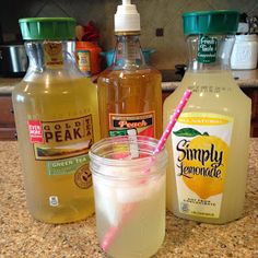 some drinks are sitting on a counter top