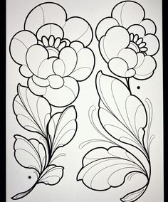 a drawing of flowers and leaves on a sheet of paper with black lines in the middle