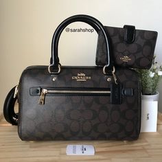 100% Authentic Coach F83607 Signature Rowan Comes With A Matching Wallet Brown/Black/Gold Hardware **New With Tags** Approximate Measurements: 10″ (L) X 6.5″ (H) X 5″ (W) Handles With 5.5" Drop Detachable Strap With 21" Drop For Shoulder Or Crossbody Wear Mom Purses, Coach Purses Outlet, Coach Leather Handbags, Luxury Bags Collection, Coach Tote Bags, Black Leather Satchel, Coach Leather, Purses Michael Kors, Coach Swagger Bag