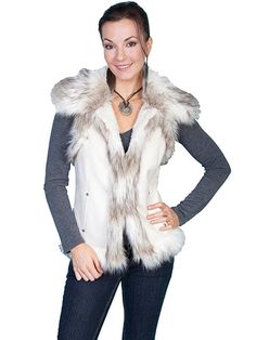 This stylish faux fur vest boasts an abundance of faux fur on the shoulders, front, and bottom. Equipped with two side pockets and a hook and eye closure, it's lined with 100% acrylic faux fur for extra warmth and comfort. The body is crafted from 100% polyester faux suede. Dry cleaning is highly recommended. American West Handbags, Women Faux Fur Vest, Flannel Vest, Western Vest, Style Savvy, Cowgirl Outfits, Faux Fur Vest, Faux Fur Vests, Vest Fashion