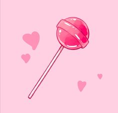 a pink lollipop on a stick with hearts