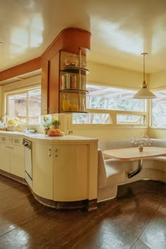 a large kitchen with an island in the middle