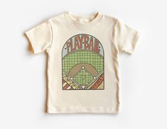 Retro Playball Baseball Field Toddler Shirt - Vintage Baseball Diamond Children's Tee - Boy Girl Toddler Youth Kids Clothing If you love super soft, lightweight, extremely comfy shirts and baby bodysuits then you will absolutely love our unisex kids shirts and baby bodysuits! These shirts are hand printed with a professional garment printer for a soft, durable, long lasting, printed graphic using high quality water based inks. * The printed design is very soft to the touch due to our printing pr Vintage Baseball Graphics, Sporty Graphic Print T-shirt For Playtime, Sporty Graphic Print Tops For Playtime, Playful Green Tops For Playdate, Playful Green Top For Playdate, Cotton Graphic Print Top For Playdate, Casual Tops With Graphic Print For Playdate, Toddler Baseball Shirt, Baseball Diamond