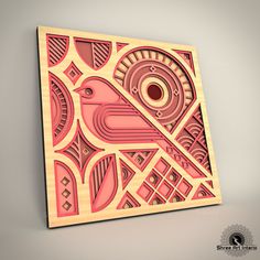 a wooden artwork piece with a bird on it