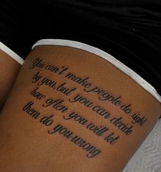 a woman with a tattoo on her thigh that says, you can make people do anything