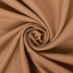 a close up view of a tan fabric