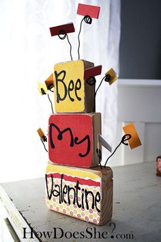 a cake made out of blocks that say bee my valentine