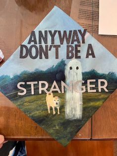 a graduation cap that says,'anyway don't be a stranger '