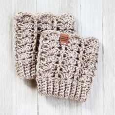 "The Lacy Boot Cuffs are created using worsted weight yarn and a size J crochet hook. An experienced beginner can make this pattern. The finished boot cuffs will measure approximately 6\" tall. The boot cuffs will fit a calf circumference between 11\" and 13\". Materials: Worsted weight (size 4) yarn, one skein Lion Brand Heartland Size J - 6mm Crochet Hook Yarn needle for weaving in ends This listing is for a PDF crochet pattern, not a finished pair of boot cuffs. When you purchase the listing, Boot Toppers Pattern, Toddler Hat Pattern, Crochet Boot Cuff Pattern, Lion Brand Heartland, Cuffs Diy, Crochet Boot Cuff, Boot Cuff Pattern, Cuff Pattern, Crochet Boot Cuffs