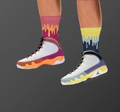 "These Jordan 9 Retro 'Change the World' inspired all-over-print socks are extra comfortable thanks to their cushioned bottom. The foot is black with artwork printed along the leg with crisp, bold colors that won't fade.  * 60% nylon/22% cotton/18% spandex * Crew length * Cushioned bottom * Ribbed leg * Cold wash with like colors and hang dry * A great year-round gift idea with graphics inspired by the Jordan 9 Retro 'Change the World' colorway! * Perfect gift for any sneakerhead! * The Jordan 9 Casual Multicolor Socks For Streetwear, Jordan 9 Particle Sz 7, Casual Multicolor Graphic Print Socks, Jordan 9 Retro, Jordan 9, Print Socks, Shoe Display, Matching Jordans, Casual Socks