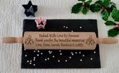 a wooden rolling pin with the words baked with love is namma thank you for the beautiful memory