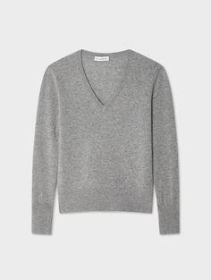 The ultimate relaxed-but-still-polished sweater, the Cashmere V Neck is a wardrobe staple that you'll love to live in. It’s spun from soft, lightweight cashmere for a straight fit with a flattering V-neckline and neatly ribbed trim. The minimal styling will make a great pairing with a high-waisted skirt or wide-leg jean. Details Straight fit. Long sleeve. Length in size small is 23". The model is 5'10 1/2" and is wearing a size small. 100% Cashmere. Hand wash cold or dry clean. Do not twist or w Classic Cashmere V-neck Sweater In Soft Knit, Classic Spring Cashmere V-neck Sweater, Classic Soft Knit V-neck Sweater For Work, Classic Cashmere V-neck Sweater With Soft Knit, Classic Soft Knit V-neck Sweater For Layering, Everyday Fall Cashmere V-neck Sweater, Grey V Neck Sweater, Crisp White Shirt, Knitwear Women