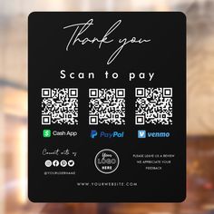 a black card with qr code on it that says, thank you scan to pay