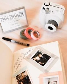 the pinterest page on instagram shows an open book with photos and pens