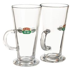 two clear glass mugs with the words central perk on each one and an oval handle