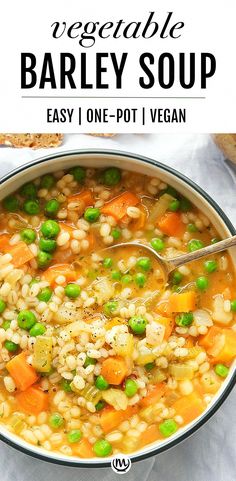 a bowl of barley soup with peas and carrots