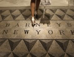 a woman in high heels walking down the street