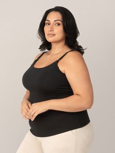 A luxe foundational piece for all breastfeeding moms. This super-cute, supportive nursing cami features clip-down cups, a fitted silhouette, and a delicate picot trim at the neckline. Crafted from a stretchy fabric chosen for its softness, breathability, and durability, this elevated nursing tank top offers a flattering fit and a built-in shelf bra with fixed padding for additional support and shaping.  Close fit great on its own or as a layering piece Nursing clips for breastfeeding and skin-to Maternity Nursing Bra, Stretch Camisole Nursing Bra With Built-in Bra, Supportive Nursing Bra For Everyday Use, Supportive Tops With Built-in Bra And Wide Straps, Maternity Tank Top With Built-in Bra, Supportive Bra-friendly Top With Wide Straps, Stretch Camisole Nursing Bra With Adjustable Straps, Supportive Sleeveless Tank Top With Adjustable Straps, Stretch Camisole Nursing Bra