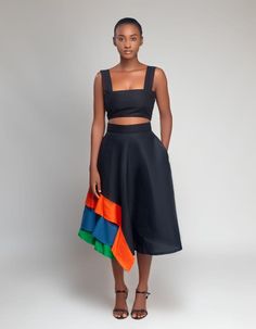 This African high fashion Mae Skirt set is perfect for weddings or any special occasion. Elevate your style with this stunning crop top and flared skirt combination from NAIA. Made with premium quality African fabrics, this set showcases the best of African clothing store offerings and represents top African brands. Stand out with this unique and stylish ensemble. Summer Party Tiered Skirt Set, Fitted Two-piece Tiered Skirt, Chic Two-piece Tiered Skirt, Flowy Tiered Skirt Set For Summer, Flowy Long Skirt Set For Summer, Summer Long Flowy Skirt Set, Flowy Skirt Set For Summer Party, Chic Multicolor Dresses With Flared Skirt, Summer Party Flowy Skirt Set